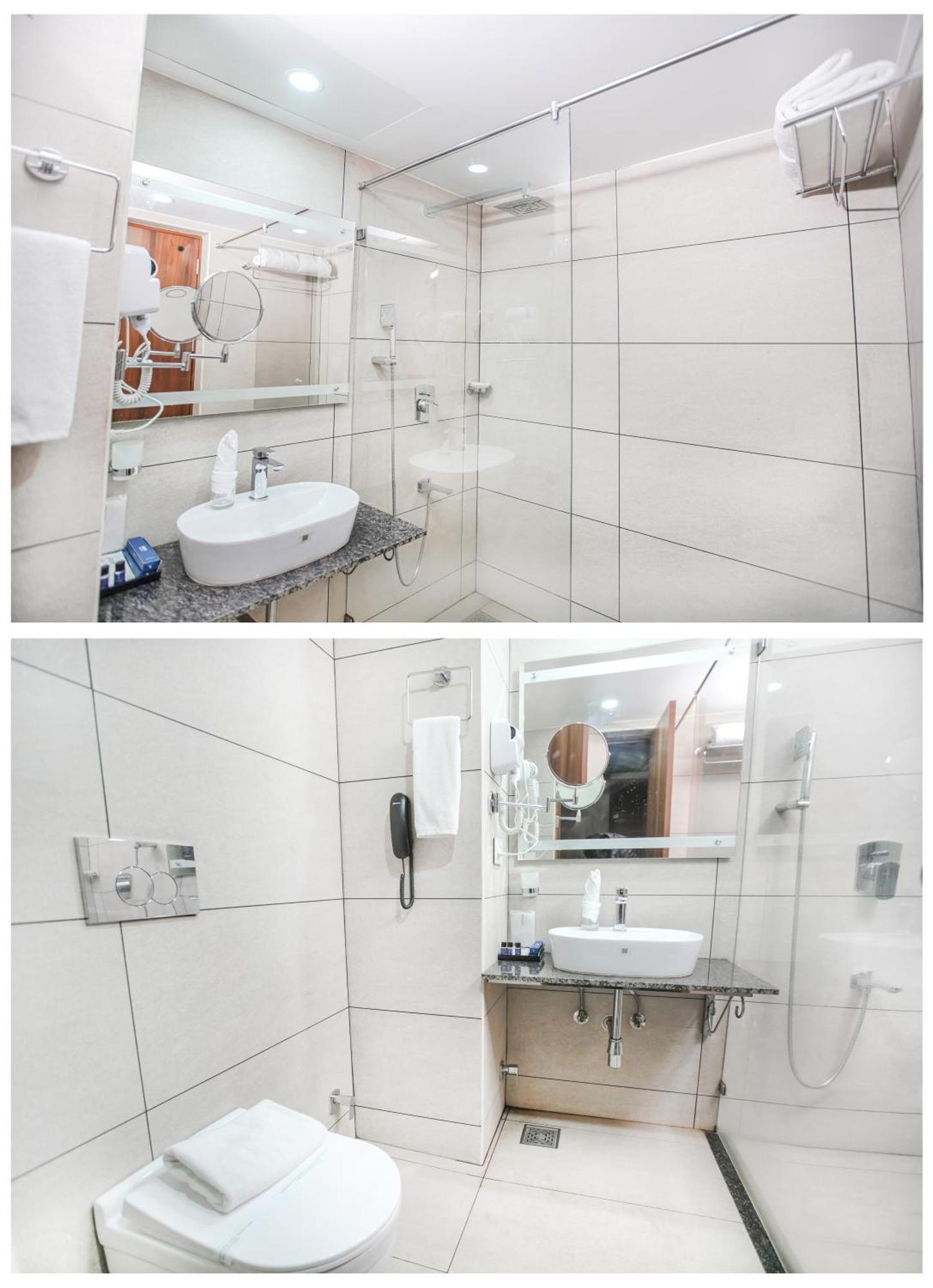 Kkm International Otel Thiruvananthapuram Oda fotoğraf